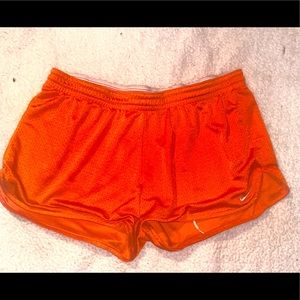 Orange Nike shorts